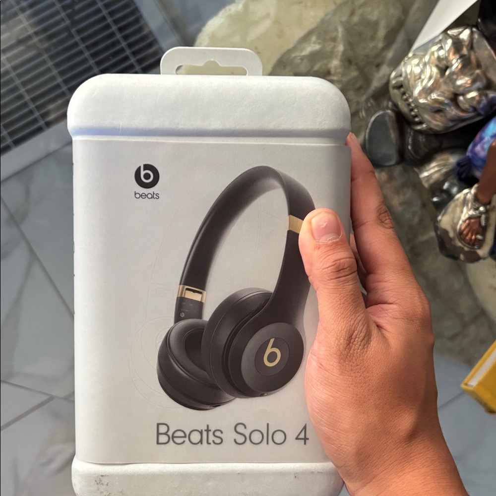 Beats Solo 4 Wireless Headphones - Black and Gold